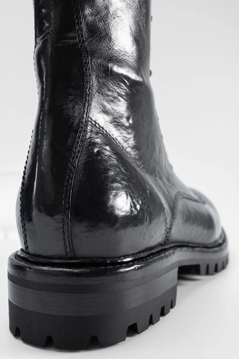 CAMDEN jet-black military boots.