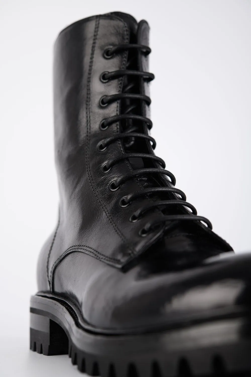 CAMDEN jet-black military boots.