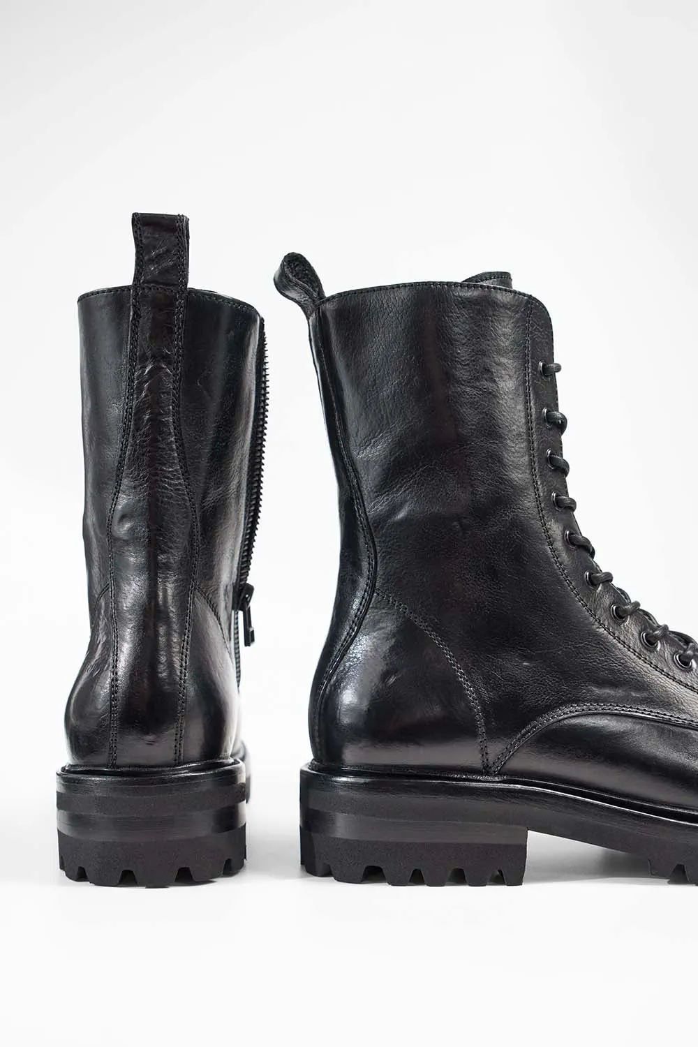 CAMDEN jet-black military boots.