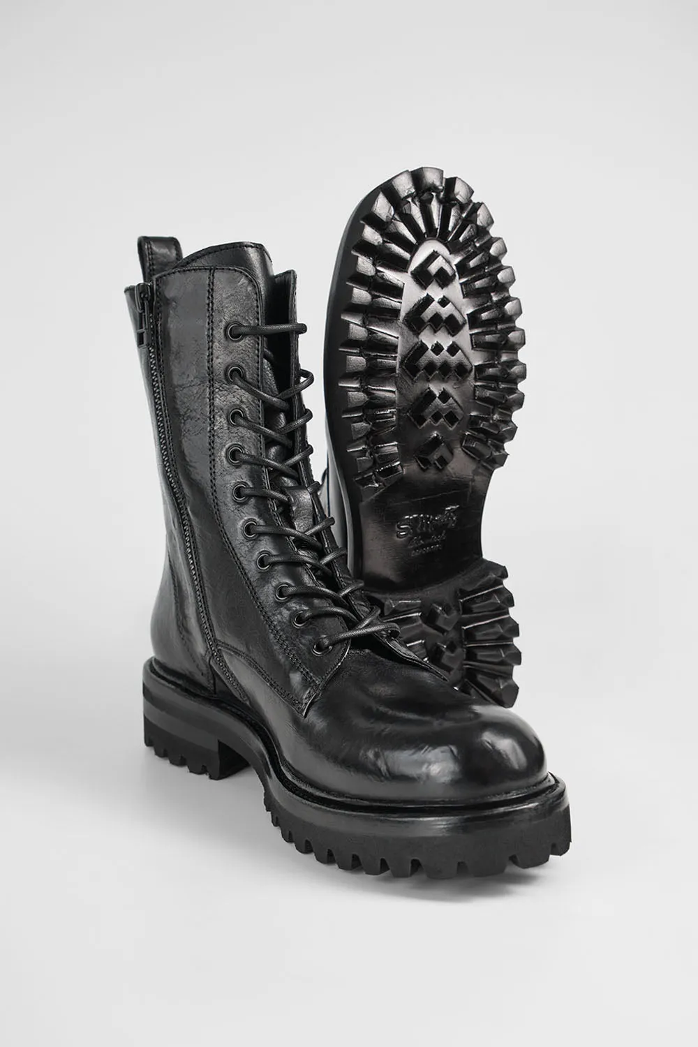 CAMDEN jet-black military boots.