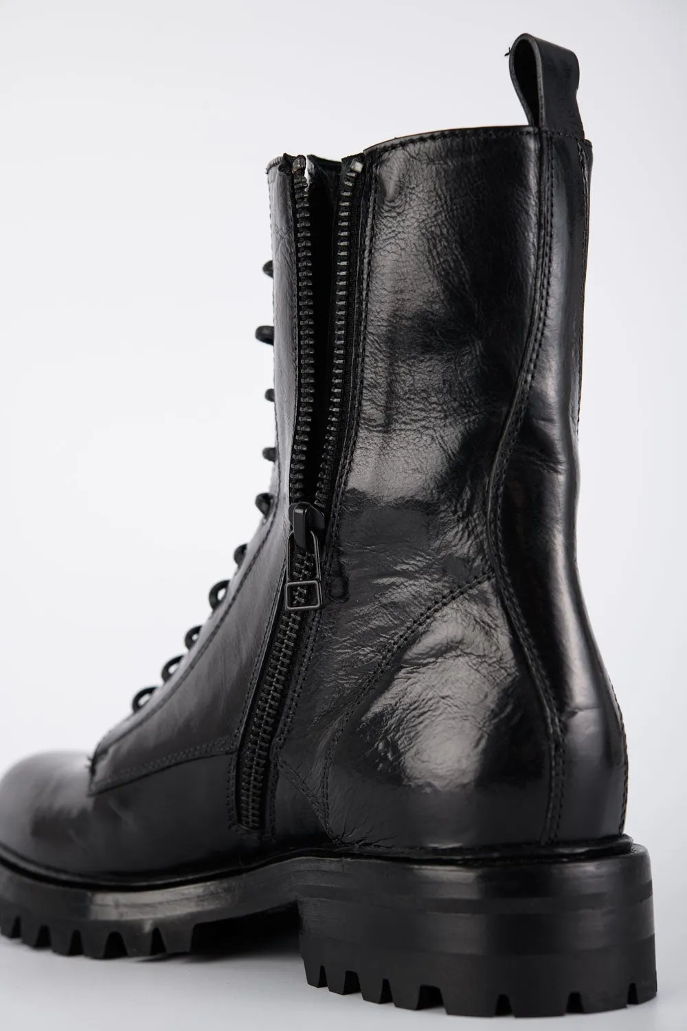 CAMDEN jet-black military boots.